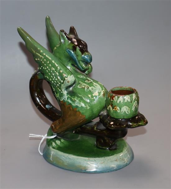 A Brannam pottery griffin chamberstick, c.1902 height 15cm